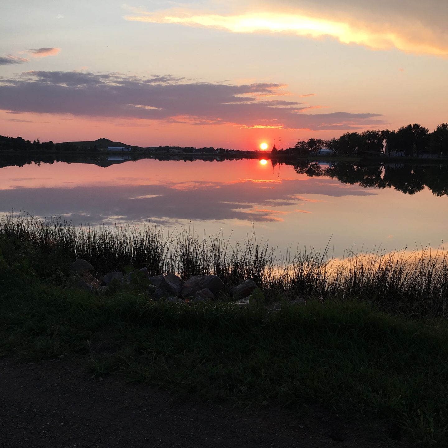 Mirror sunset over Mirror Lake in Hettinger, ND